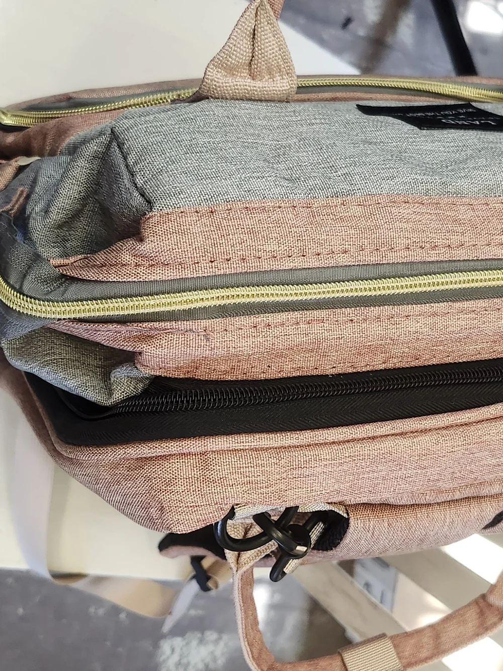 4-in-1 Rose Pink Diaper Bag with Portable Baby Bed